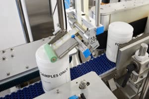 Top Labelling by the LWA Universal Wraparound Labelling Machine Shemesh Automation