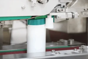 capper machine and canisters